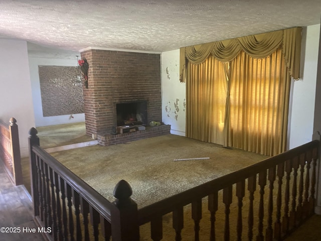 691 Wade Daughtry Rd, Faison, NC 28341 - living area featuring a textured ceiling and a brick fireplace