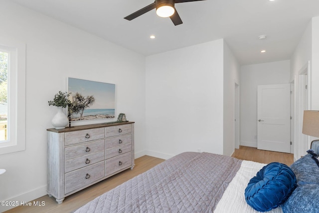 1100 S Sixth St, Carolina Beach, NC 28428 - bedroom with light wood-style floors, baseboards, and recessed lighting