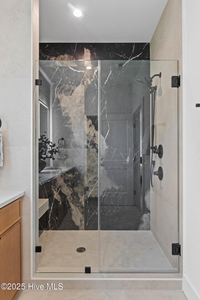 1100 S Sixth St, Carolina Beach, NC 28428 - full bath featuring a shower stall and vanity