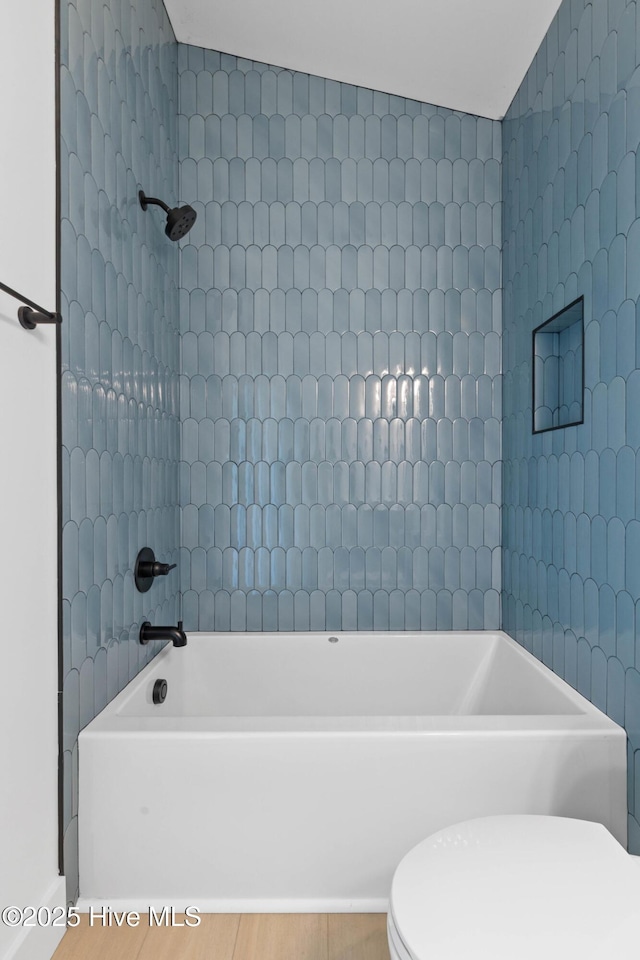1100 S Sixth St, Carolina Beach, NC 28428 - bathroom with toilet and bathtub / shower combination