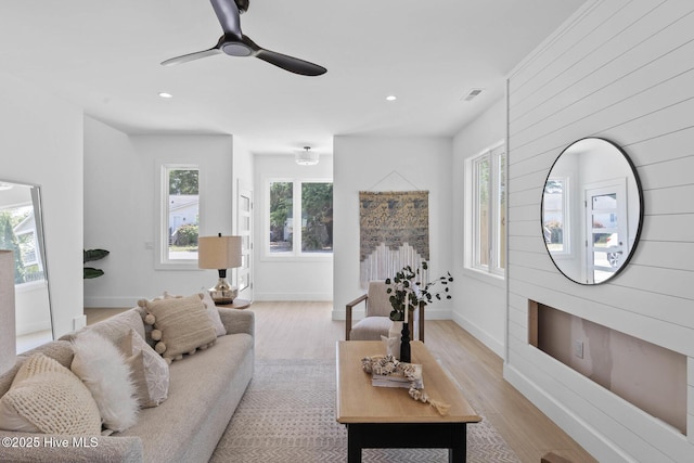 1100 S Sixth St, Carolina Beach, NC 28428 - living area with light wood-style flooring, recessed lighting, a ceiling fan, and baseboards