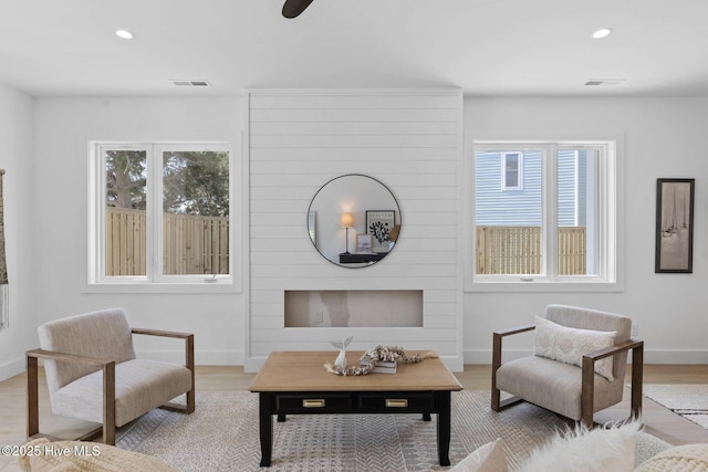 1100 S Sixth St, Carolina Beach, NC 28428 - living area with recessed lighting, baseboards, and wood finished floors
