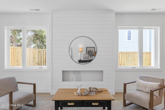 1100 S Sixth St, Carolina Beach, NC 28428 - living area with wood finished floors and baseboards