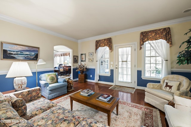 482 Riverwood Dr SE, Bolivia, NC 28422 - living area with ornamental molding, wood finished floors, baseboards, and arched walkways