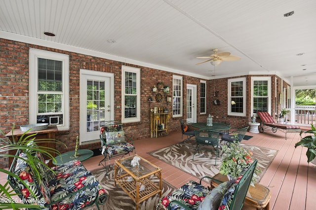 482 Riverwood Dr SE, Bolivia, NC 28422 - wooden deck with ceiling fan and outdoor dining space
