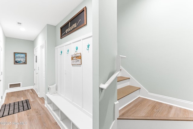 822 S Topsail Dr Unit B, Surf City, NC 28445 - mudroom with wood finished floors and baseboards