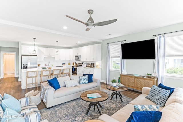 822 S Topsail Dr Unit B, Surf City, NC 28445 - living room featuring plenty of natural light, baseboards, wood finished floors, ceiling fan, and recessed lighting