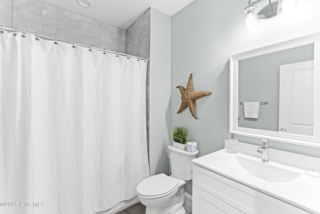 822 S Topsail Dr Unit B, Surf City, NC 28445 - full bath featuring toilet, vanity, and a shower with shower curtain