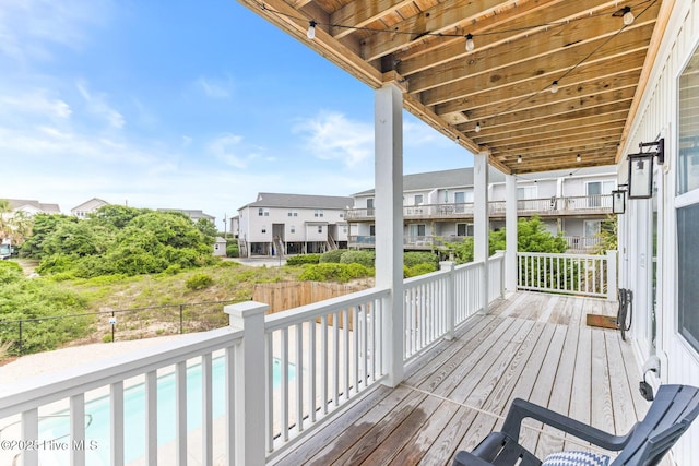 822 S Topsail Dr Unit B, Surf City, NC 28445 - wooden deck featuring a residential view