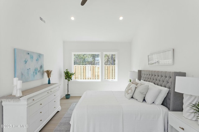 609 Augusta Ave, Carolina Beach, NC 28428 - bedroom with light wood finished floors, recessed lighting, baseboards, and a ceiling fan