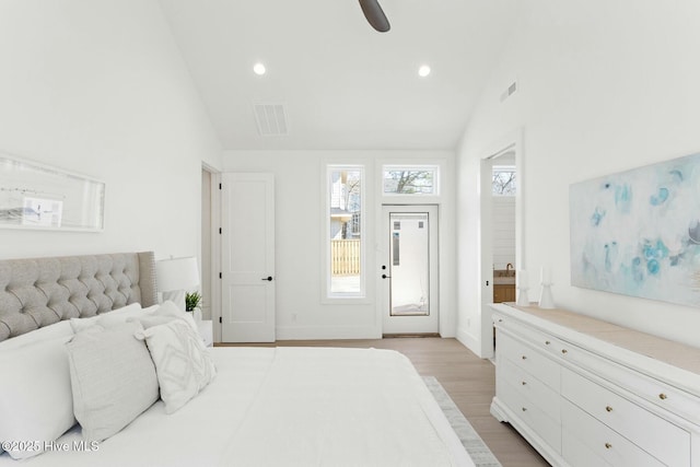609 Augusta Ave, Carolina Beach, NC 28428 - bedroom with vaulted ceiling, access to outside, light wood-style floors, recessed lighting, and ceiling fan