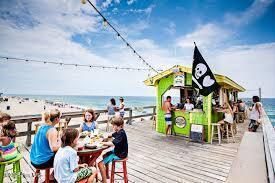 609 Augusta Ave, Carolina Beach, NC 28428 - surrounding community featuring a deck with water view