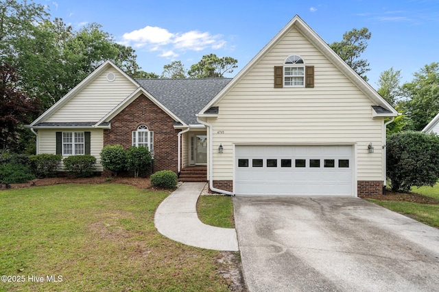 4705 Rushing Dr, Wilmington, NC 28409 - traditional-style home featuring concrete driveway, a front yard, brick siding, and roof with shingles