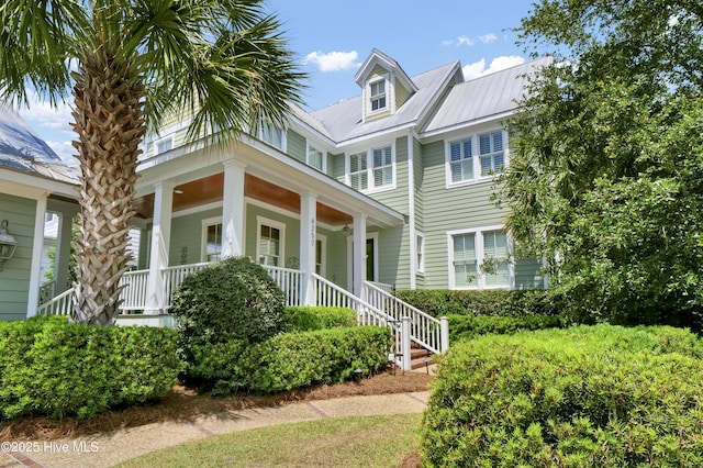 6257 Chalfont Cir, Wilmington, NC 28405 - view of front facade featuring a porch and metal roof