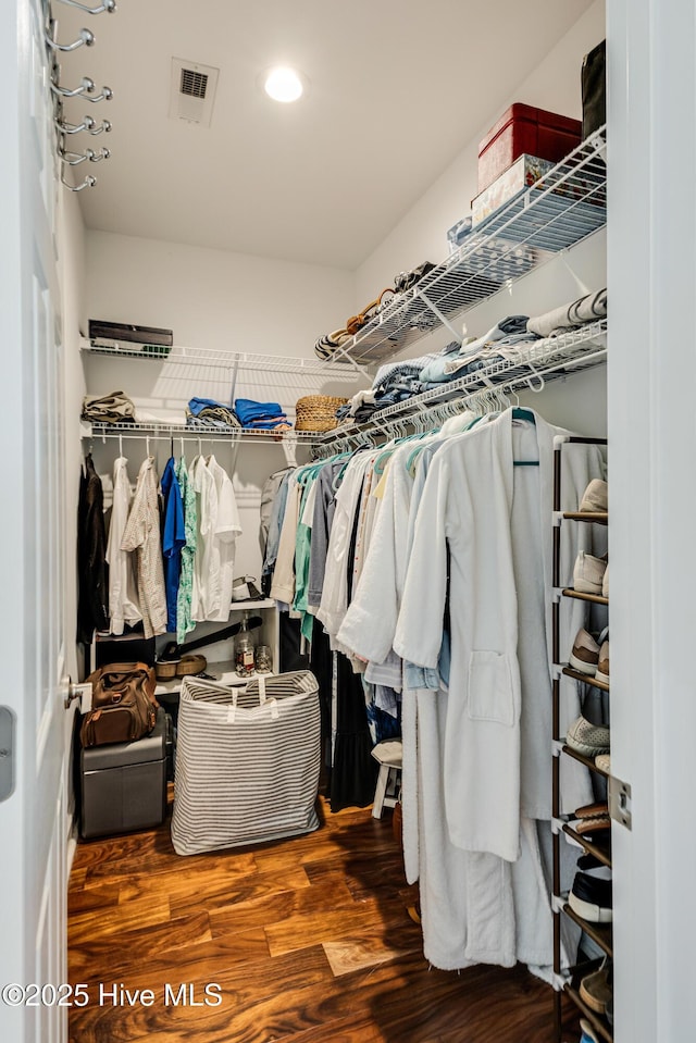 104 NE 63rd St, Oak Island, NC 28465 - walk in closet featuring wood finished floors