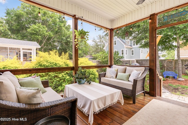 104 NE 63rd St, Oak Island, NC 28465 - sunroom with an outdoor hangout area and ceiling fan