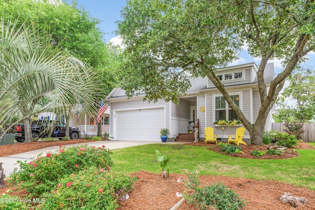 104 NE 63rd St, Oak Island, NC 28465 - view of front of house with driveway, a garage, and a shingled roof