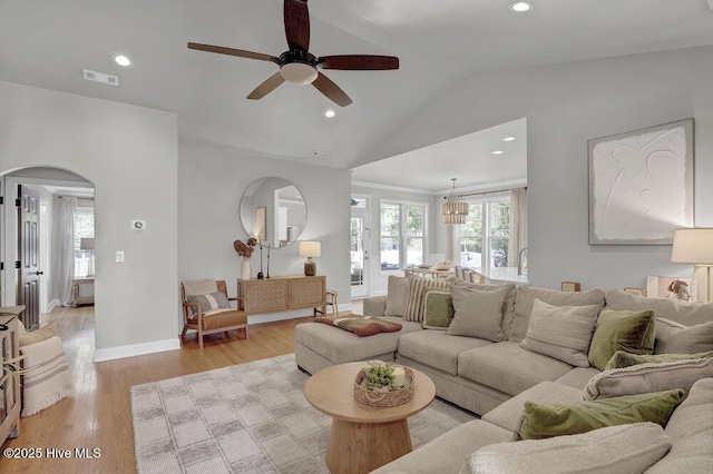 127 Azalea Dr, Hampstead, NC 28443 - living room featuring arched walkways, ceiling fan, lofted ceiling, recessed lighting, and light wood-type flooring