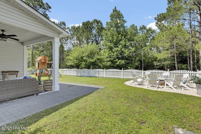 127 Azalea Dr, Hampstead, NC 28443 - view of yard featuring a playground, a patio, a ceiling fan, and view of scattered trees