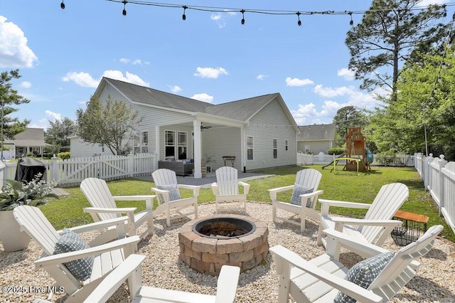 127 Azalea Dr, Hampstead, NC 28443 - view of patio with a fire pit, a playground, and ceiling fan