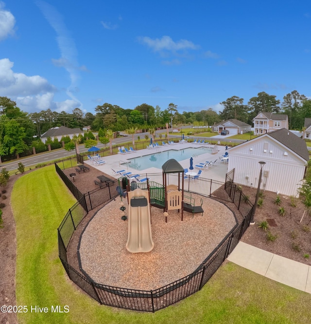 9308 Little Osprey Dr, Calabash, NC 28467 - view of play area with a community pool and a patio