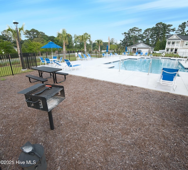 9308 Little Osprey Dr, Calabash, NC 28467 - community pool with a patio