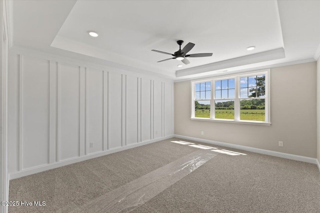 2190 Heartland Rd, Battleboro, NC 27809 - spare room with a raised ceiling, carpet flooring, ceiling fan, baseboards, and recessed lighting