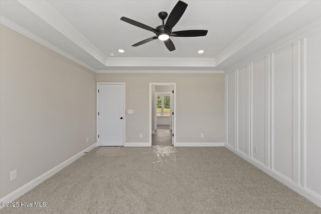 2190 Heartland Rd, Battleboro, NC 27809 - unfurnished room featuring a raised ceiling, light carpet, ceiling fan, baseboards, and ornamental molding