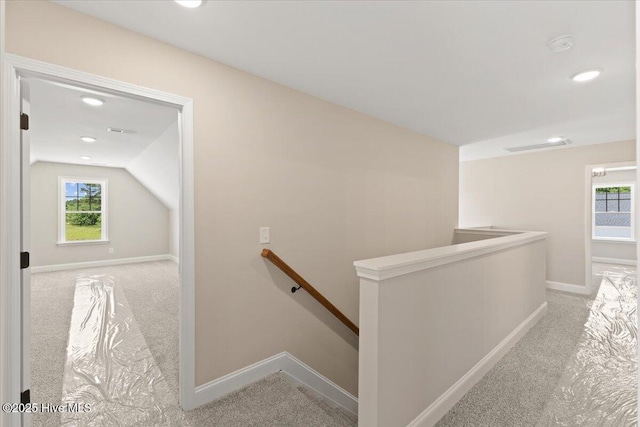 2190 Heartland Rd, Battleboro, NC 27809 - hallway featuring an upstairs landing, light colored carpet, baseboards, healthy amount of natural light, and recessed lighting
