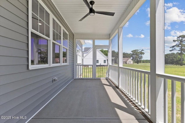 2190 Heartland Rd, Battleboro, NC 27809 - unfurnished sunroom with a ceiling fan