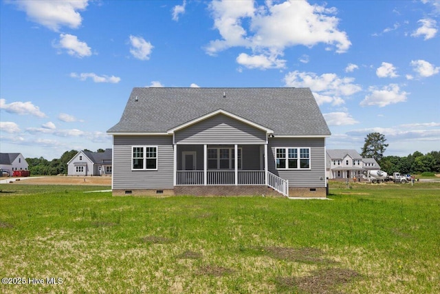 2190 Heartland Rd, Battleboro, NC 27809 - rear view of house featuring crawl space, a sunroom, a lawn, and roof with shingles