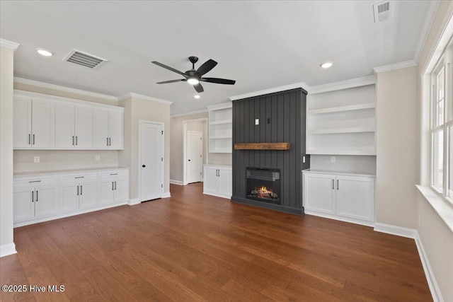 2190 Heartland Rd, Battleboro, NC 27809 - unfurnished living room with a ceiling fan, dark wood-style flooring, baseboards, a fireplace, and crown molding