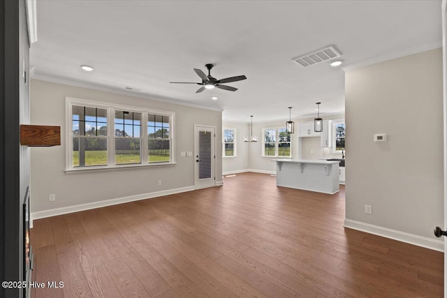 2190 Heartland Rd, Battleboro, NC 27809 - unfurnished living room featuring crown molding, ceiling fan, dark wood-type flooring, baseboards, and recessed lighting