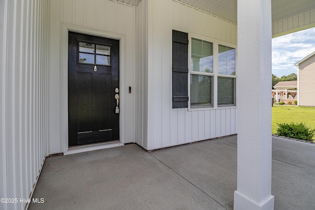 1707 N Carolina St, Goldsboro, NC 27530 - view of exterior entry with a porch