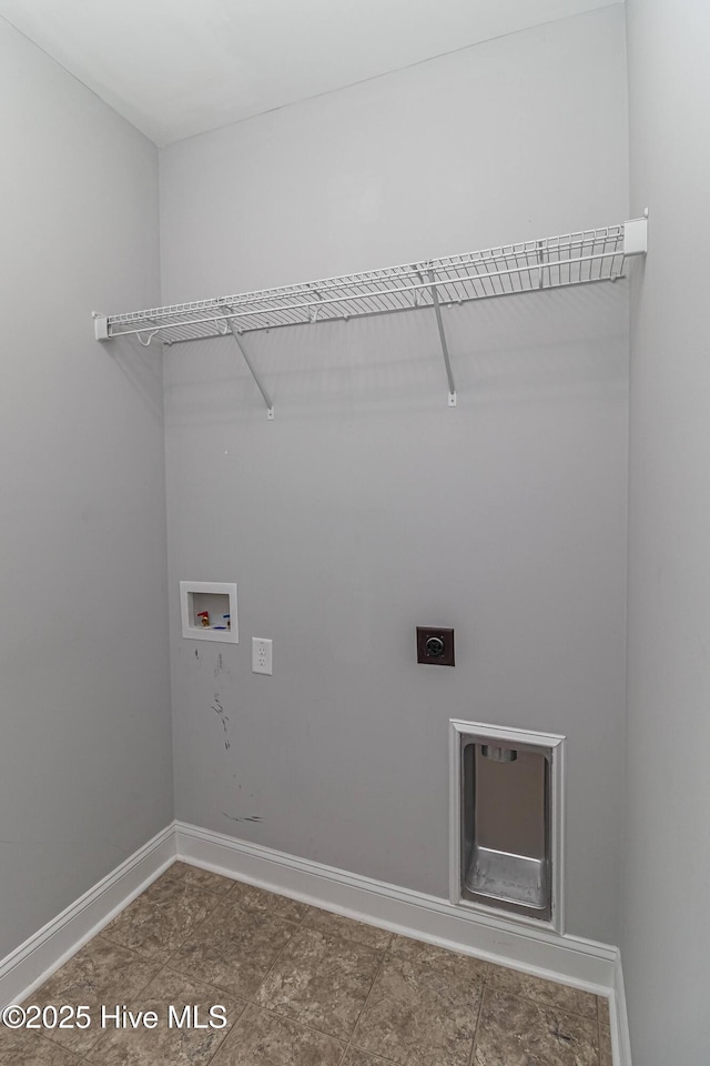 1707 N Carolina St, Goldsboro, NC 27530 - laundry room featuring hookup for an electric dryer, hookup for a washing machine, and baseboards