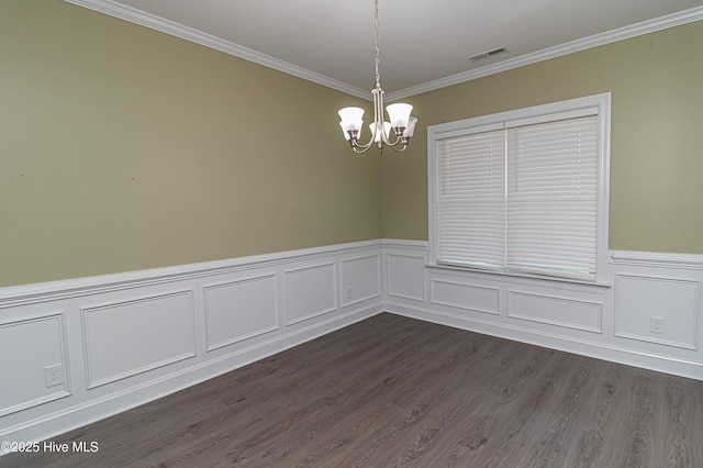 1707 N Carolina St, Goldsboro, NC 27530 - unfurnished room with a chandelier, ornamental molding, dark wood finished floors, and wainscoting