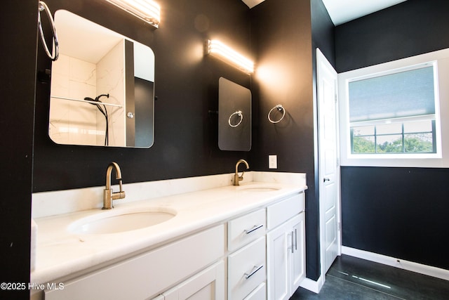 302 N 16th St, Morehead City, NC 28557 - bathroom featuring double vanity and baseboards