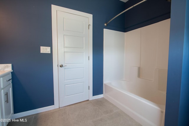 302 N 16th St, Morehead City, NC 28557 - full bath featuring vanity, baseboards, tile patterned floors, and  shower combination