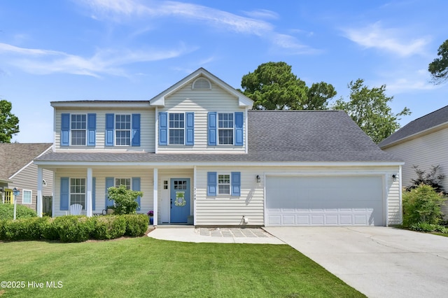 5109 Gate Post Ln, Wilmington, NC 28412 - view of front facade with a garage, driveway, a front yard, and a shingled roof