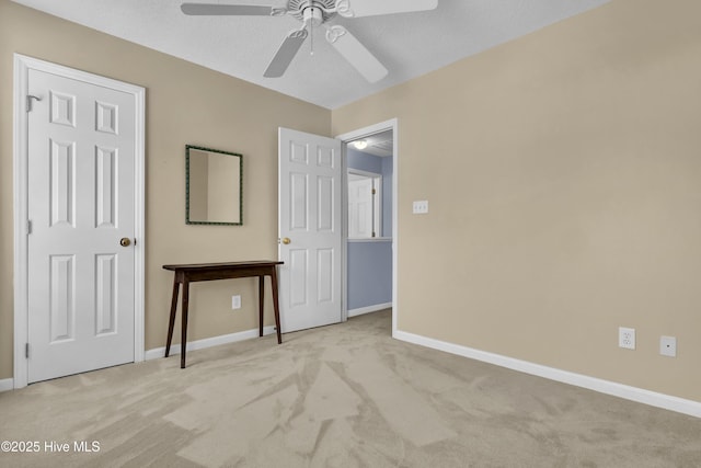 5109 Gate Post Ln, Wilmington, NC 28412 - unfurnished bedroom with carpet floors, baseboards, and ceiling fan
