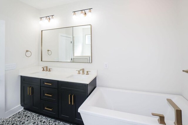 472 Yadkin Rd, Southern Pines, NC 28387 - bathroom with a soaking tub, double vanity, and tile patterned floors