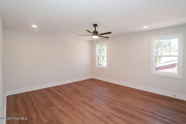 472 Yadkin Rd, Southern Pines, NC 28387 - unfurnished room with baseboards, wood finished floors, recessed lighting, and ceiling fan