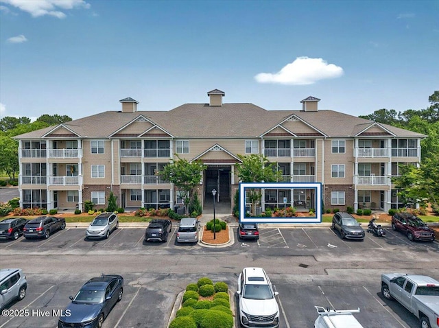 250 S Crow Creek Dr NW Unit 1, Calabash, NC 28467 - view of property with uncovered parking