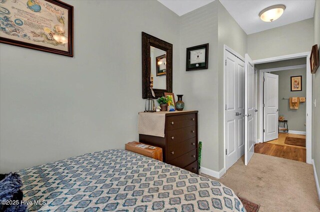 250 S Crow Creek Dr NW Unit 1, Calabash, NC 28467 - bedroom with carpet flooring, baseboards, and a closet