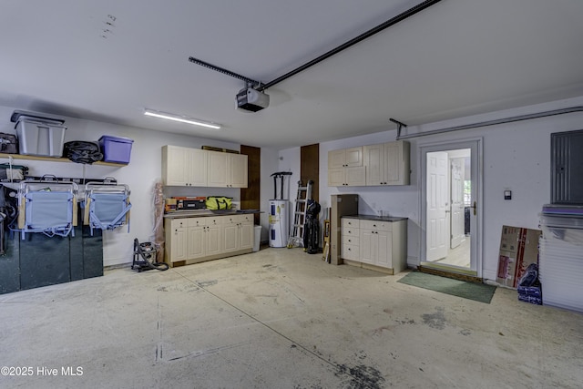 302 Gaskins Ln, Wilmington, NC 28411 - garage featuring electric water heater and a garage door opener