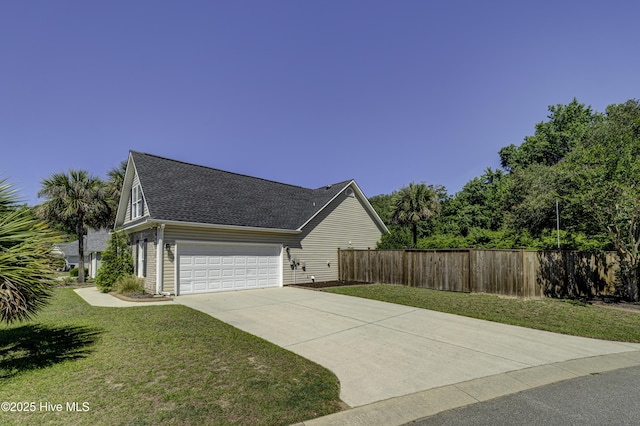 302 Gaskins Ln, Wilmington, NC 28411 - view of side of property featuring concrete driveway, a shingled roof, and a garage