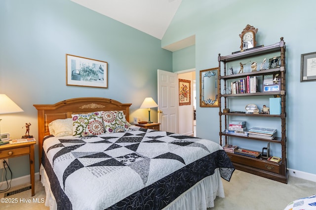 308 Crooked Gulley Cir, Sunset Beach, NC 28468 - bedroom featuring carpet floors, vaulted ceiling, and baseboards