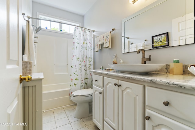 308 Crooked Gulley Cir, Sunset Beach, NC 28468 - full bath with tile patterned flooring, toilet, vanity, and shower / bathtub combination with curtain