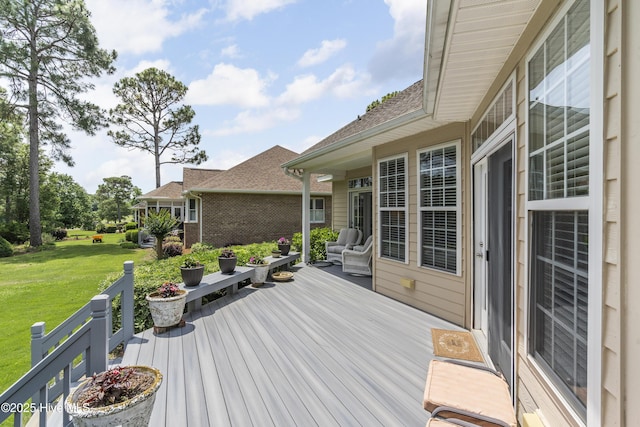 308 Crooked Gulley Cir, Sunset Beach, NC 28468 - wooden deck featuring a lawn
