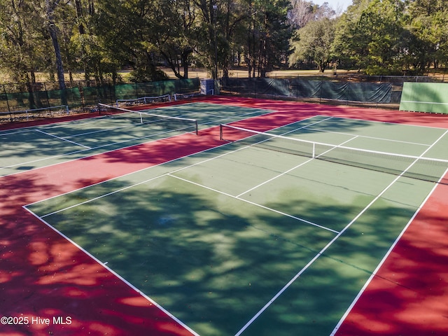308 Crooked Gulley Cir, Sunset Beach, NC 28468 - view of tennis court featuring community basketball court and view of scattered trees
